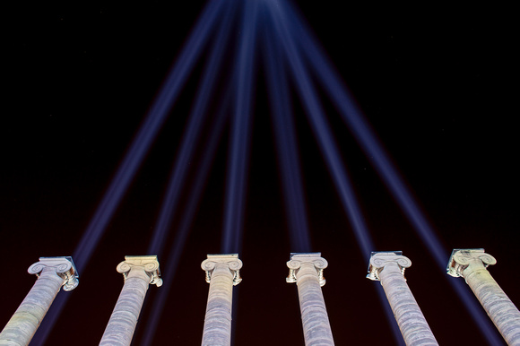 Mizzou columns with lights shining into the sky